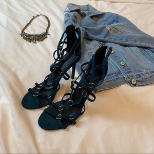 Strappy heels with metal hooks